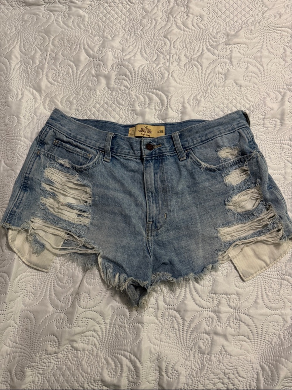 Hollister Vintage-Inspired Light Blue Distressed Denim Shorts with Embroidery